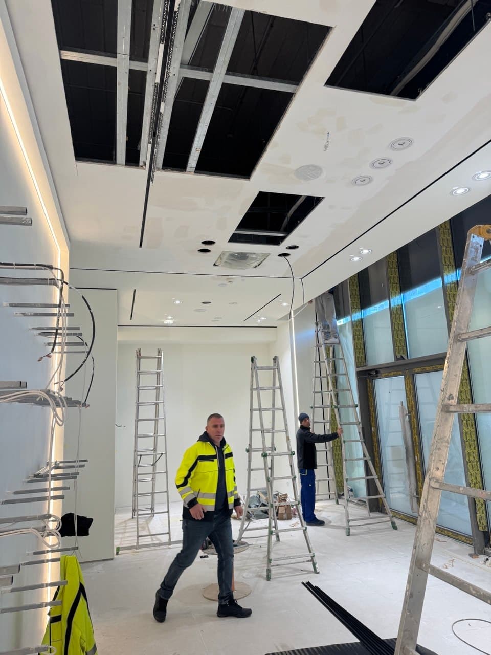Floor leveling and specialized retail lighting feeds